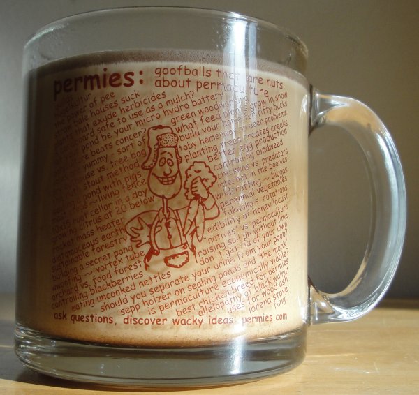 glass mug with coffee and cream